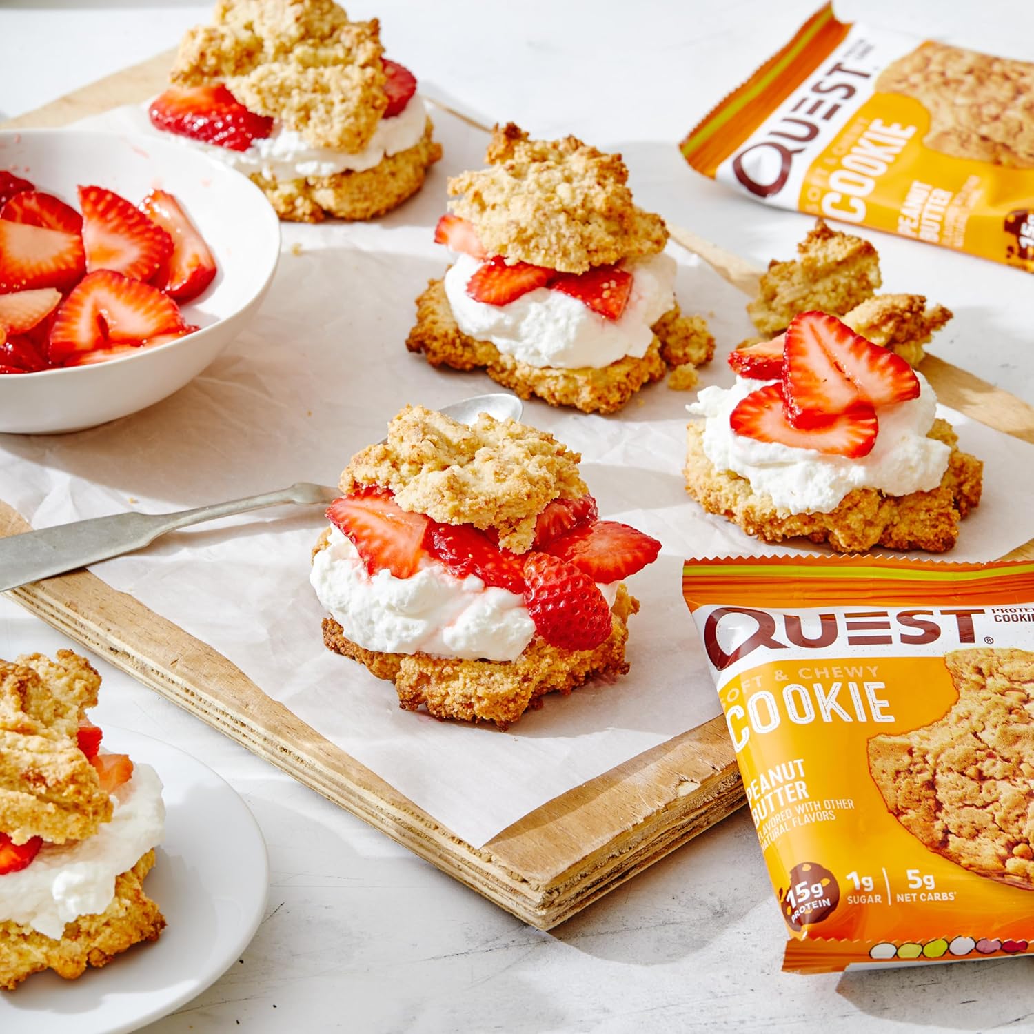 Peanut butter cookies with strawberries and cream on Quest Nutrition Cookie featuring chewy white chocolate