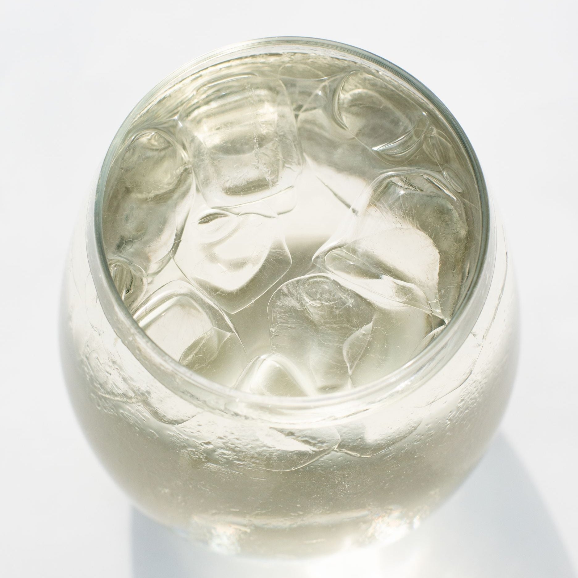 Silver ring with intricate design on a white background