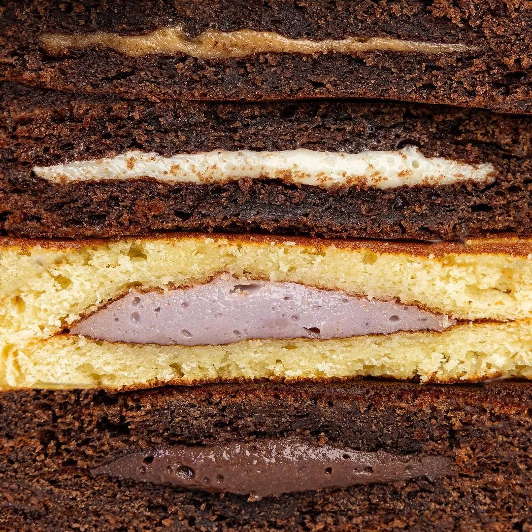 Delicious whipped protein layered dessert bars with soft pancakes and whey protein