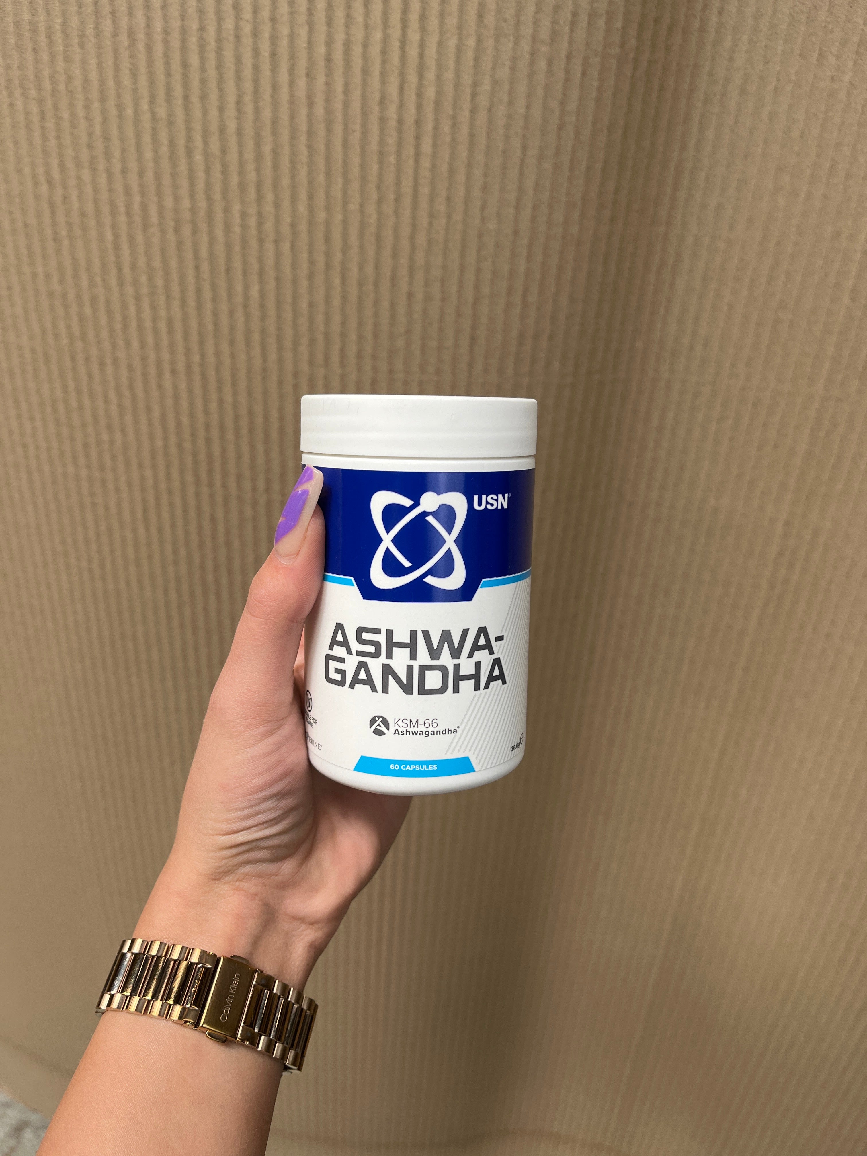 USN Ashwagandha bottle with root extract capsules in white and blue packaging