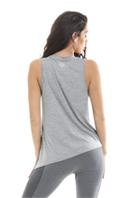 Gold’s Gym Ladies angled vest in gray with reflective gold’s gym details