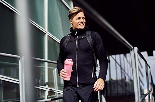 Man in athletic wear with a pink Smartshake One Shaker mixer net for protein drinks