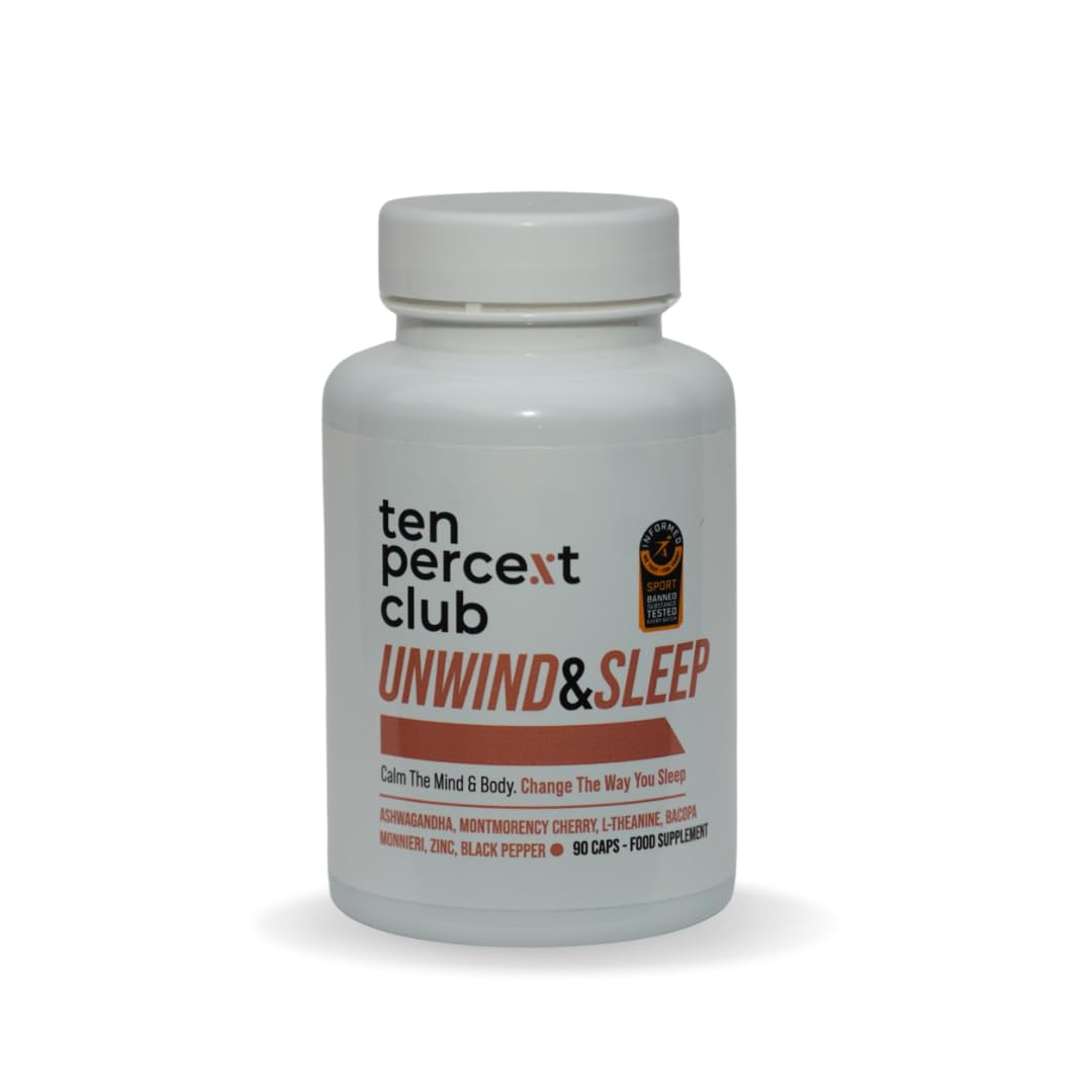 White bottle of Unwind & Sleep capsules with a brown label for restorative sleep and adaptogenic mushrooms