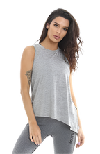 Golds Gym ladies angled vest shown on woman in light grey top and dark grey leggings