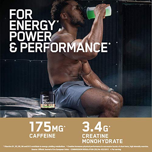 Muscular guy in athletic wear drinking from shaker with Optimum Nutrition Gold Standard Pre-Workout