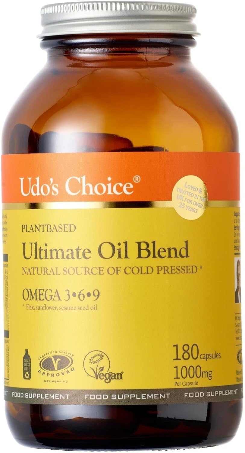 Brown glass bottle of Udo’s Choice Ultimate Oil Blend Caps with plant-based omega 3 6 9