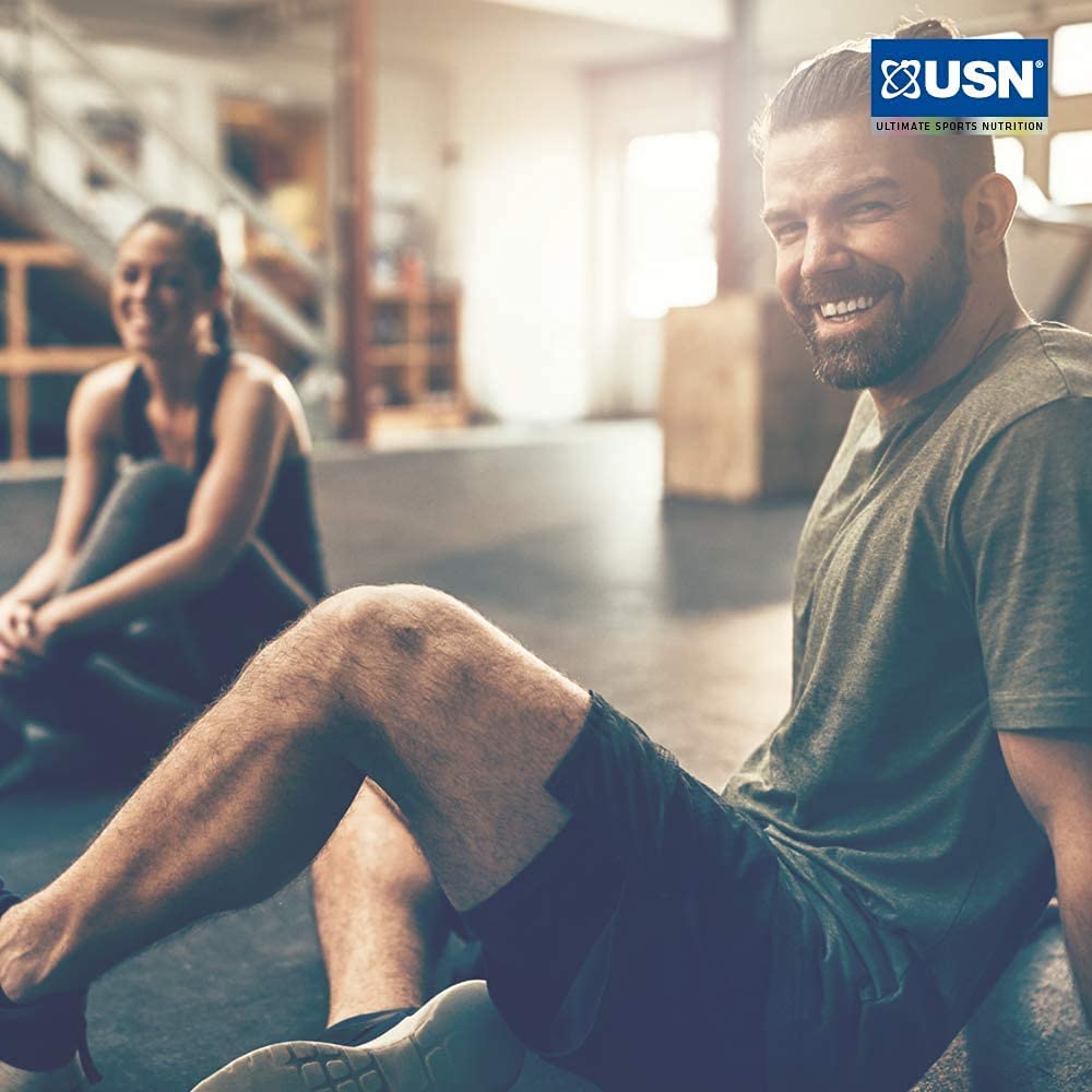Two people relaxing after workout with USN Ashwagandha root extract supplement