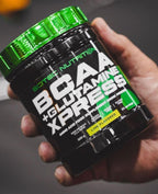 Black tub of Scitec Nutrition BCAA + Glutamine Xpress lime flavor 300g amino acids