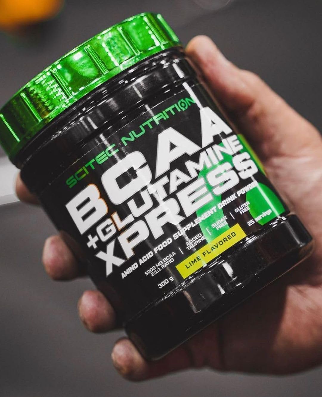 Black tub of Scitec Nutrition BCAA + Glutamine Xpress lime flavor 300g amino acids