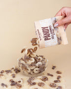 PANDY Candy cola-flavored gummy candies poured into a bowl, perfect with peach rings or fizzy bottles