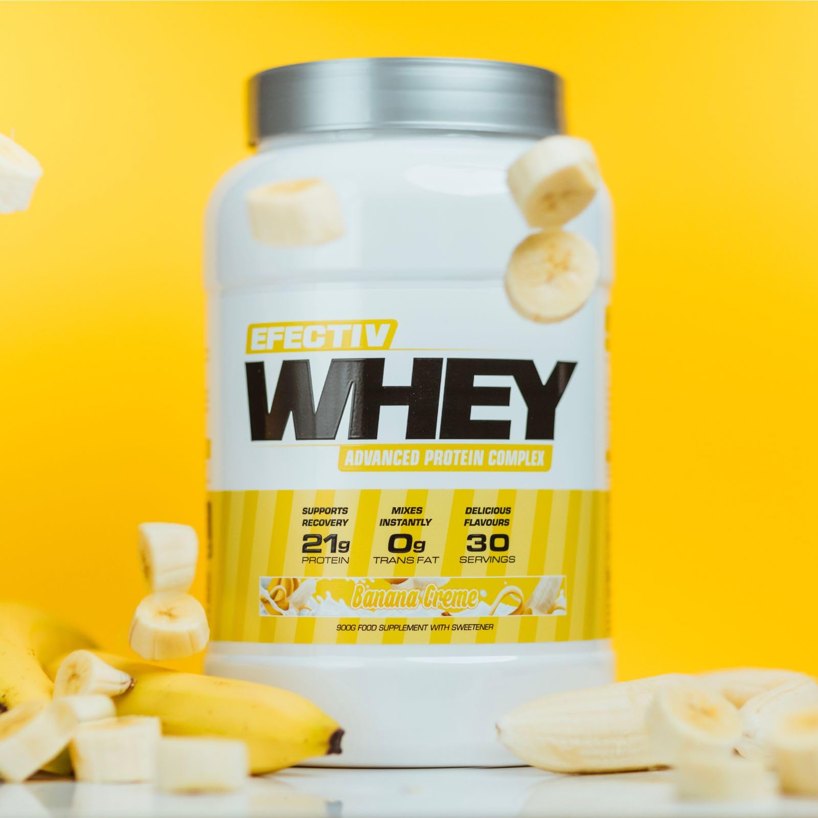 White tub of Efectiv Nutrition Whey with banana flavor, highly bioavailable whey for lean muscle