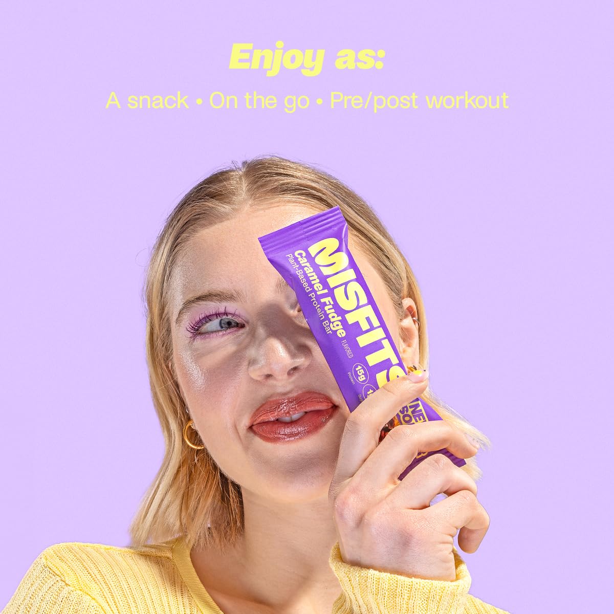 Purple-wrapped Misfits Plant-Based Protein Bar with Caramel Fudge flavor