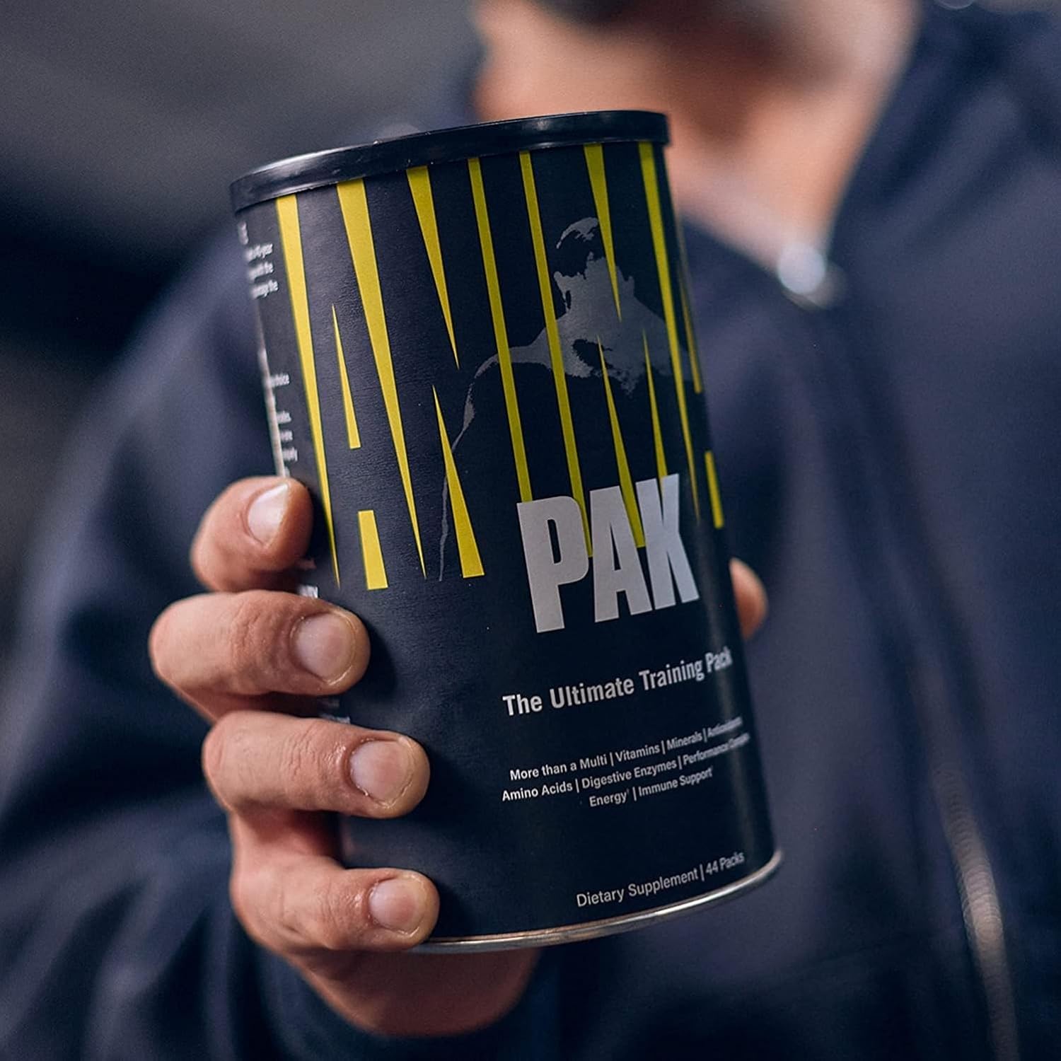 Dark Animal Pak supplement container with yellow and white lettering for great-tasting powder