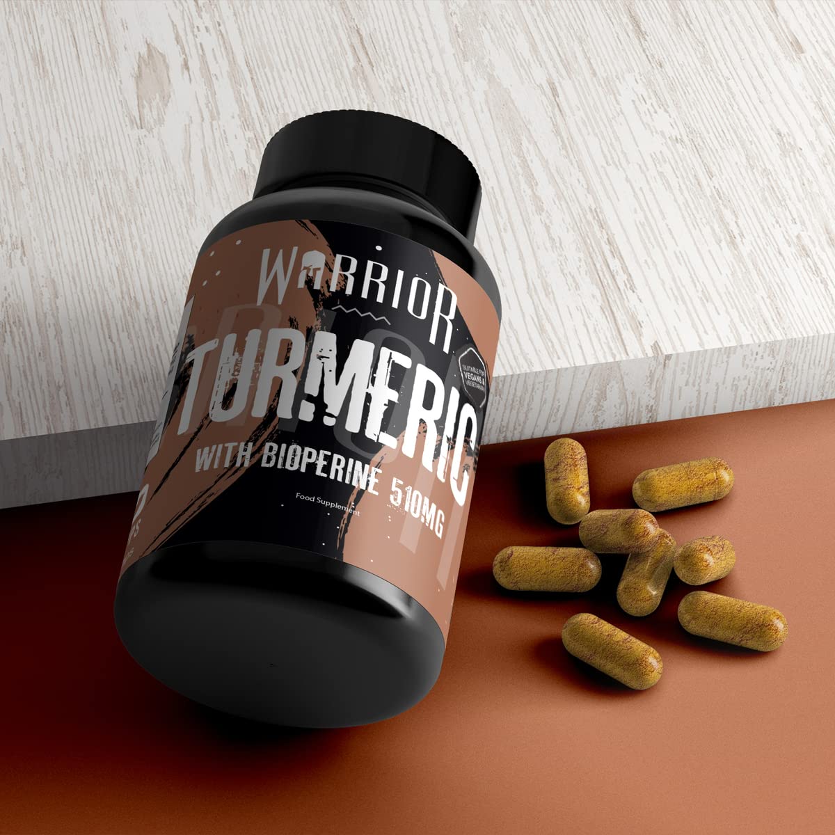 Black Warrior Core Turmeric with Bioperine bottle and yellow capsules, organic 500mg turmeric, 10mg bioperine