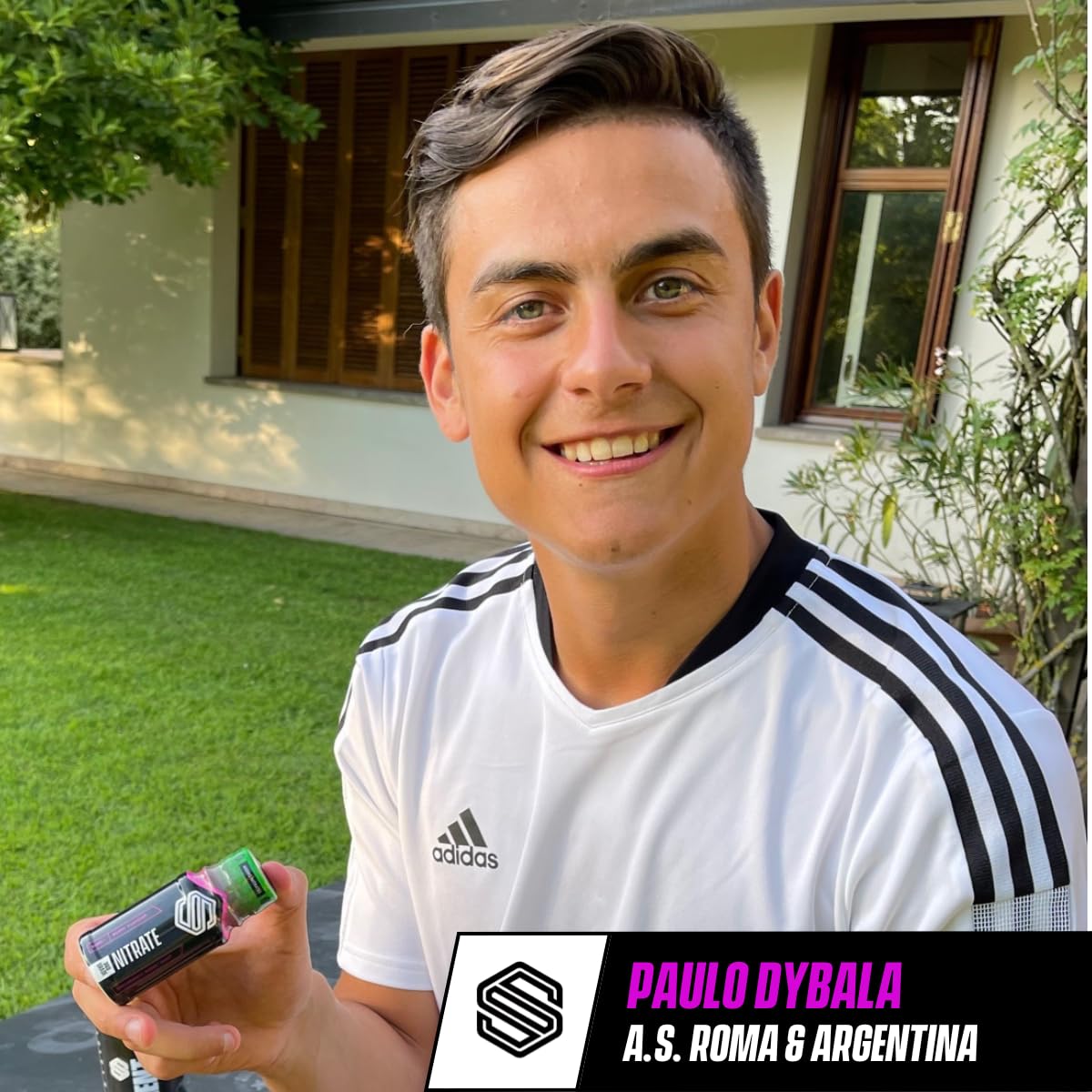 Smiling man holding Soccer Supplement Nitrate Shot for boosting athletic performance
