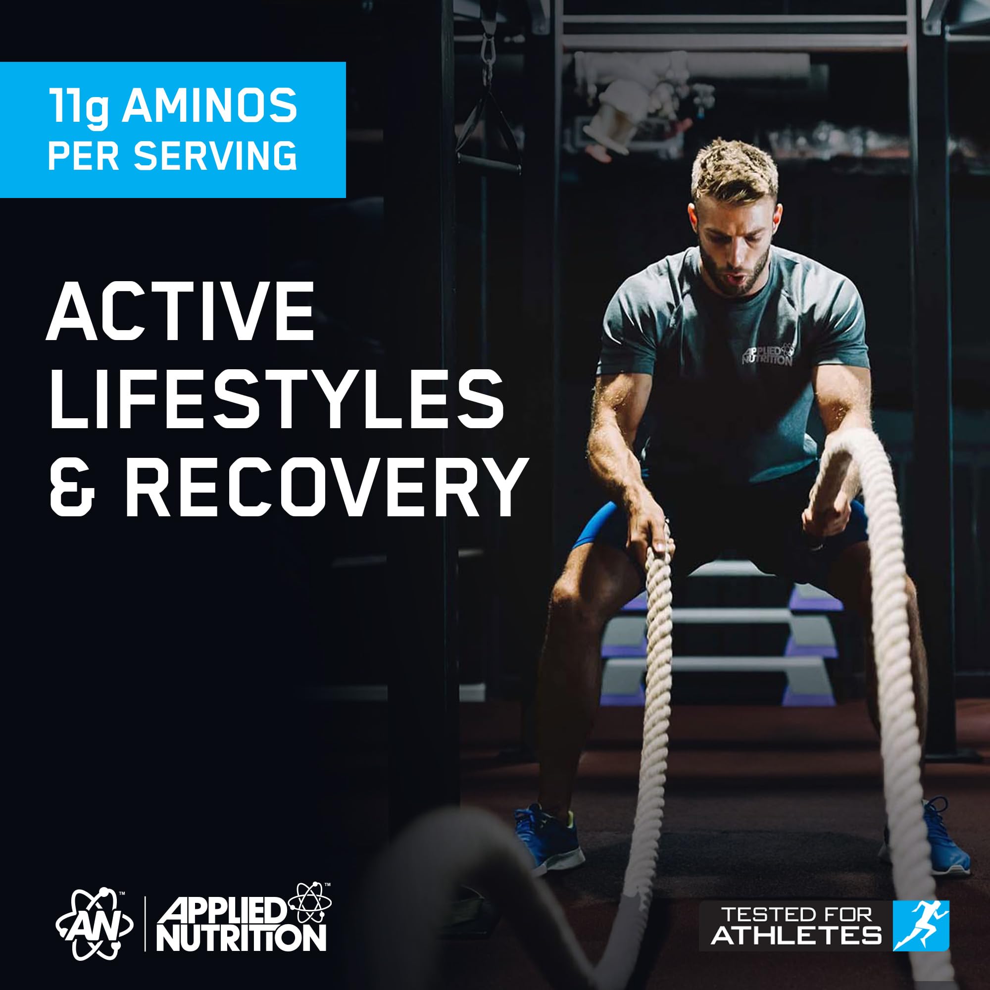 Male athlete doing battle rope exercises for muscle recovery with Applied Nutrition Amino Fuel