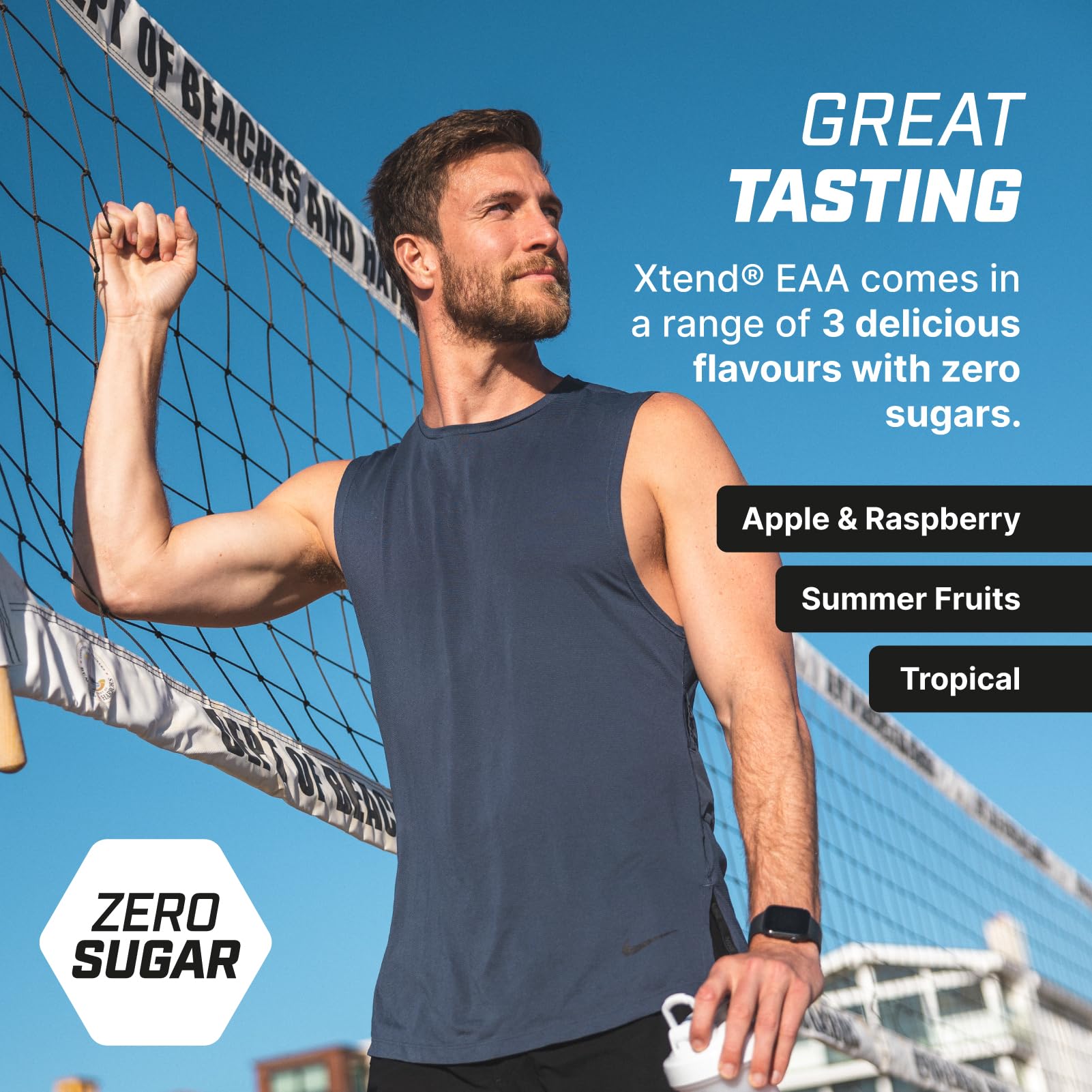 Man standing next to volleyball net holding a drink with XTEND EAAs for recovery