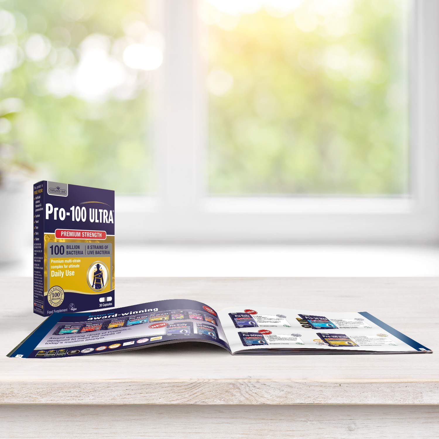Natures Aid Pro-100 Ultra probiotics box with brochure showing billion live cultures