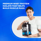 Man holding Biotech USA Iso Whey Zero Lactose Free protein container for muscle gains