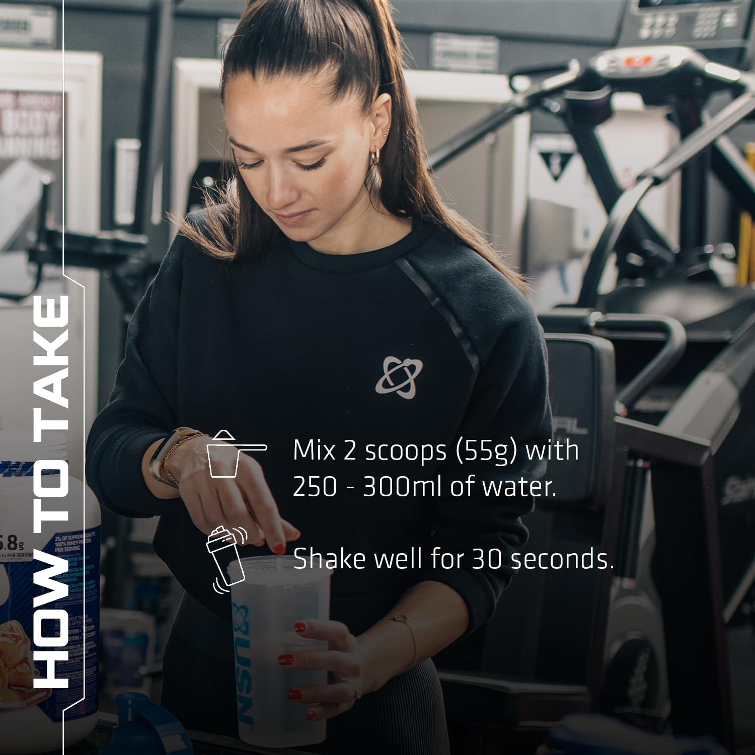 Woman preparing USN Diet Fuel Ultralean meal replacement shake for high protein calorie control