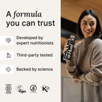 Woman holding Huel Ready-to-Drink Black Edition 8x500ml Chocolate Peanut Butter bottle