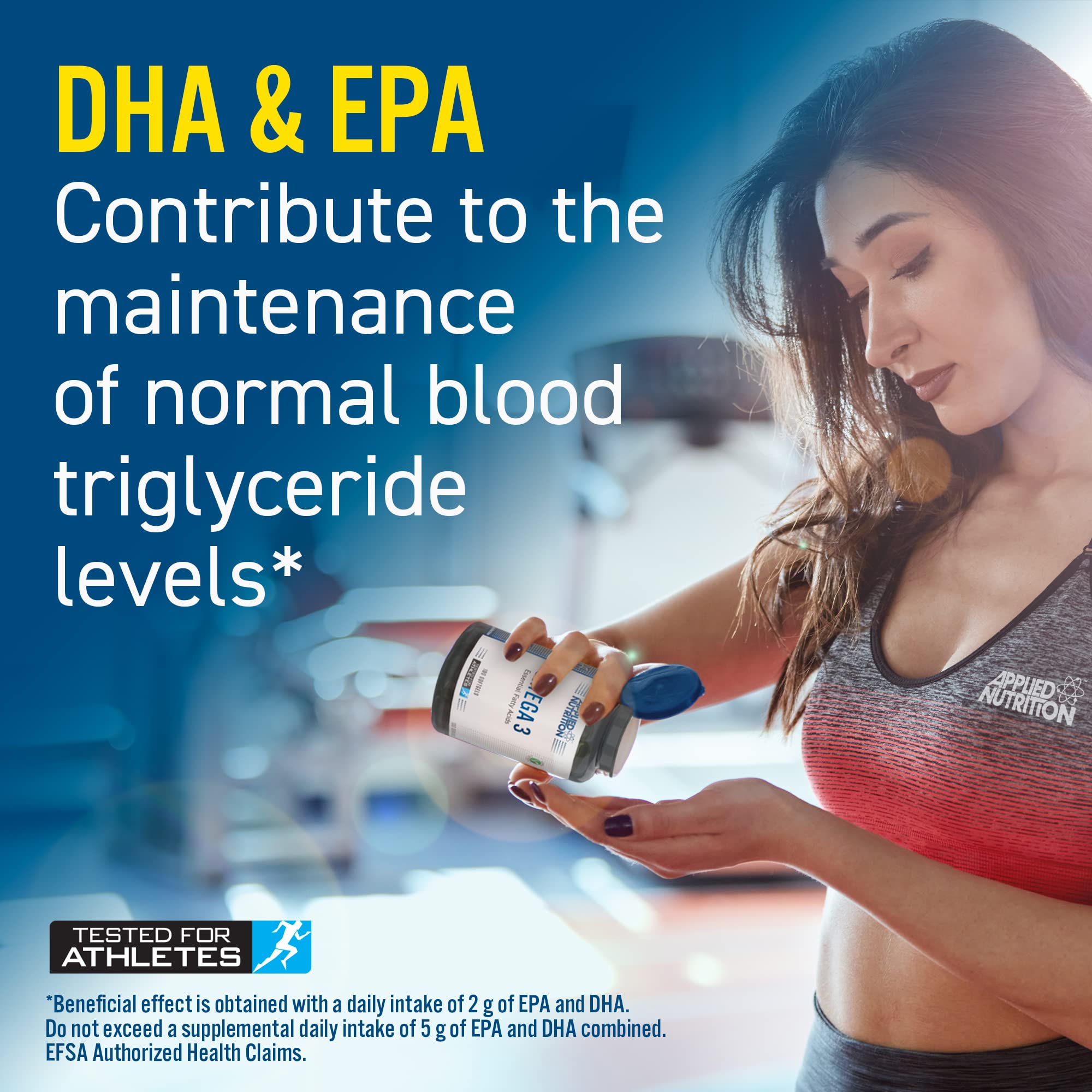 Woman with Applied Nutrition Omega halal certified fish oil supplement pouring eicosapentaenoic acid into her hand