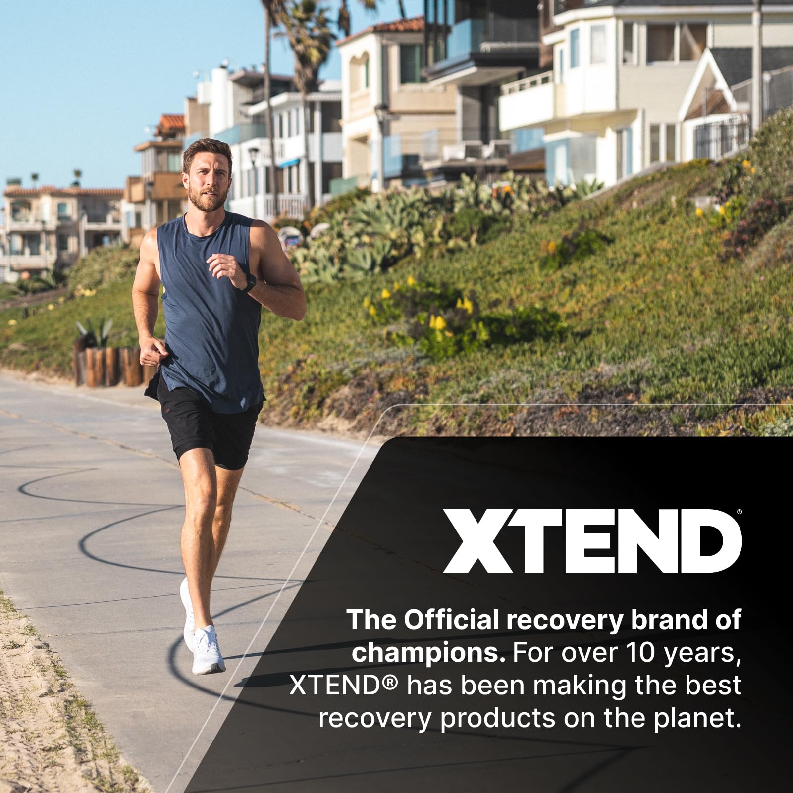 Man running on paved path wearing XTEND EAAS workout supplement gear