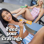 Two women in swimsuits holding Barebells Vegan Protein Bar for a healthy snack