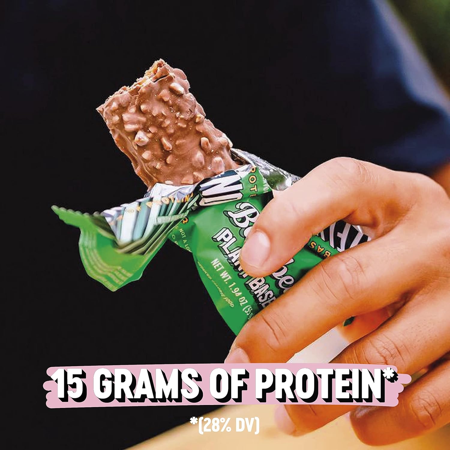 Barebells Vegan Protein Bar with chocolate and nut coating, plant-based snack