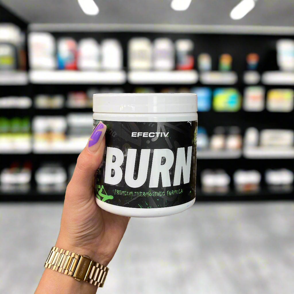 Hand holding Efectiv Nutrition Burn supplement for support fat loss and premium thermogenic formula