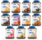 Nine jars of Protein powder arranged in a 3x3 grid on a plain white background. Each jar has a blue lid and a white label with different flavor illustrations: banana, chocolate, nuts, coffee, beach/sunset, orange, chocolate drizzle, strawberry, vanilla, and coconut.