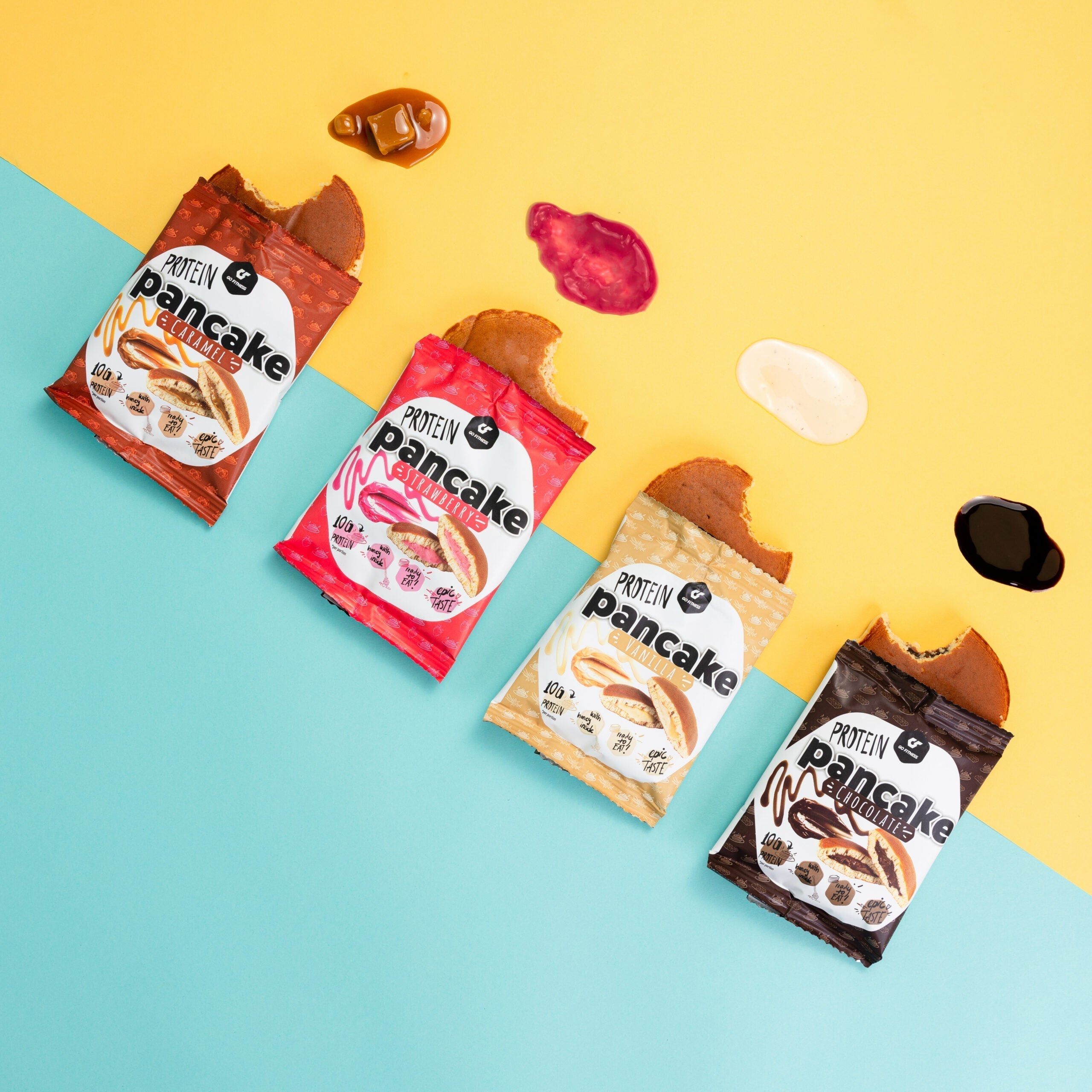 Four open Go Fitness Protein Pancake packages with delicious whipped protein fillings