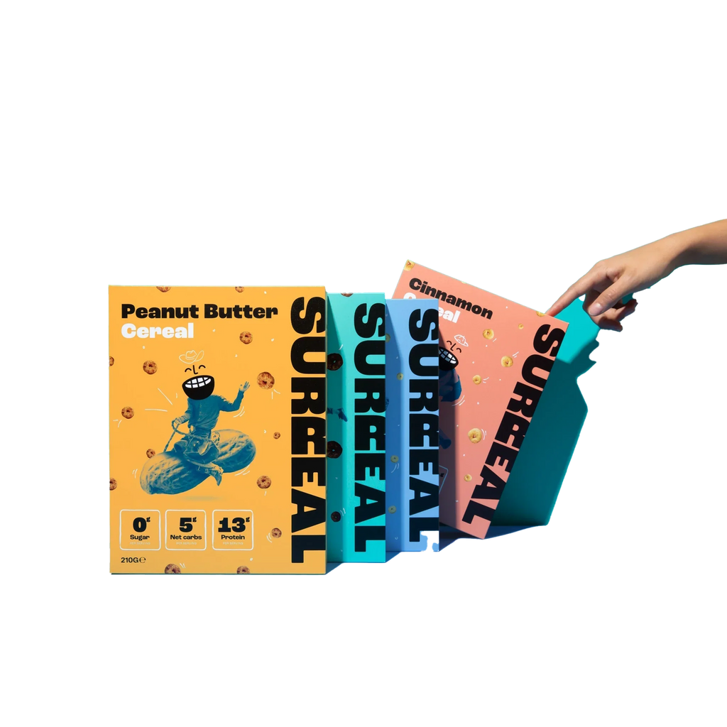 Four colorful Surreal Protein Cereal boxes with a hand pulling one for a tasty breakfast
