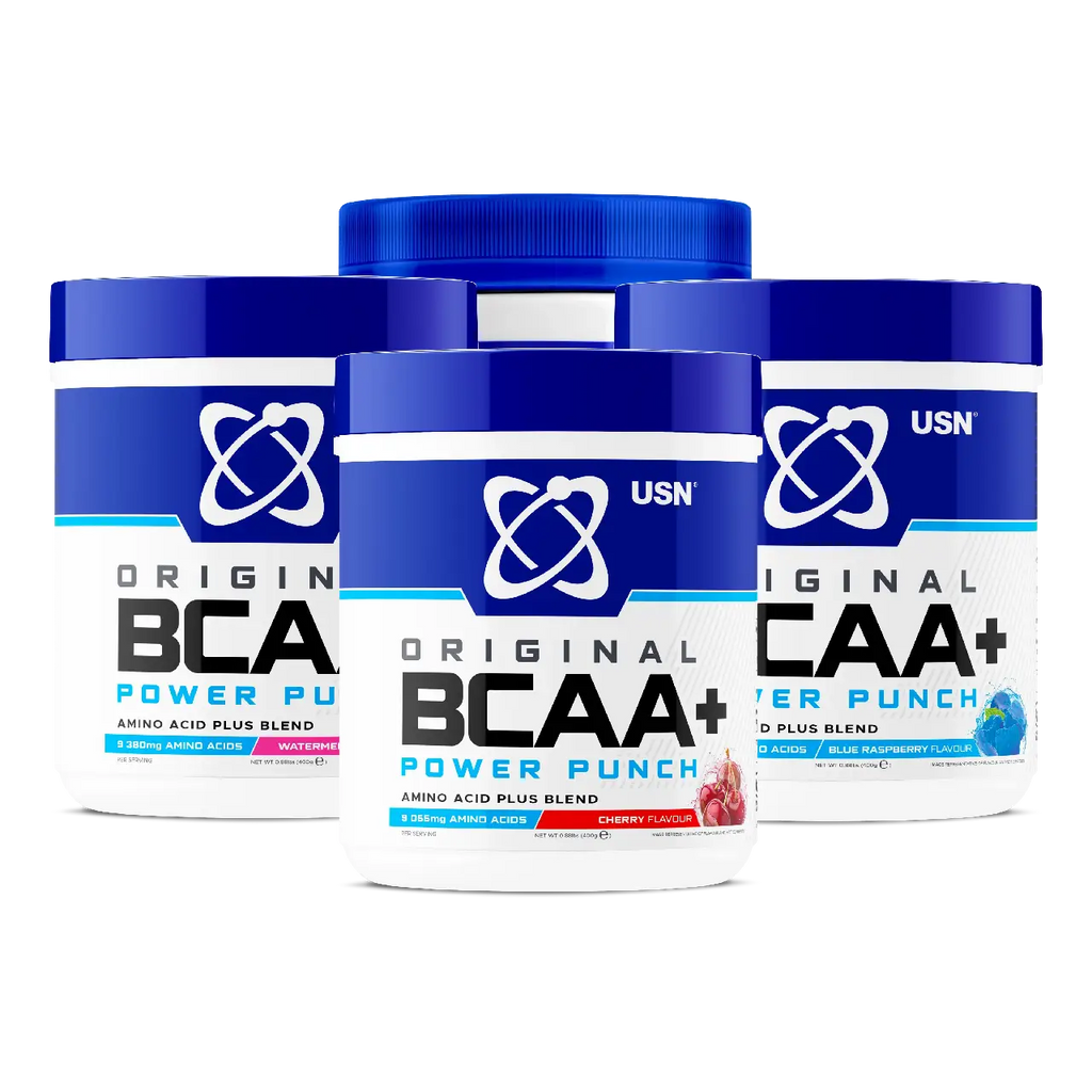 Five USN BCAA Power Punch containers in various flavors for muscle growth and protein synthesis