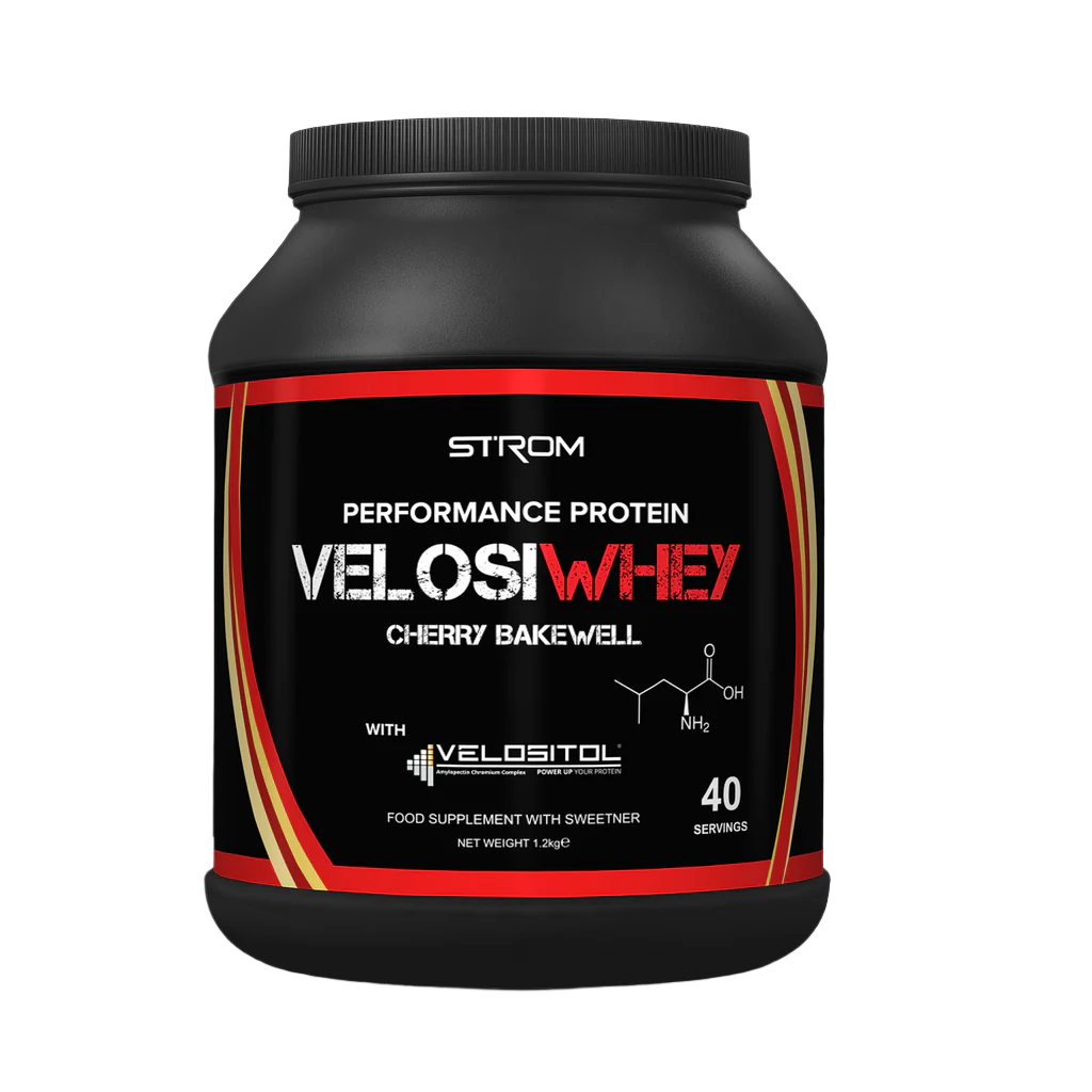 Black plastic tub of Strom Sports VelosiWhey Cherry Bakewell protein powder 1.2kg