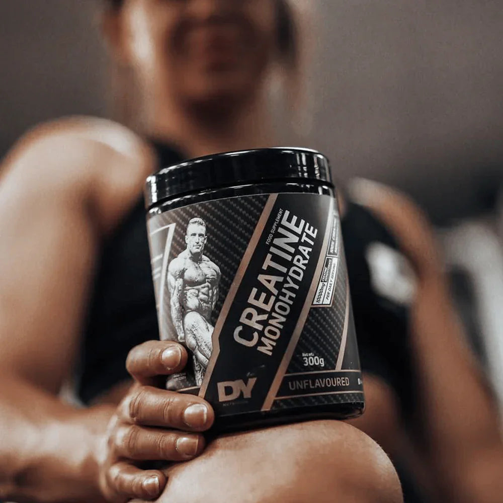 Black tub of DY Nutrition Creatine Monohydrate for muscle growth and physical performance