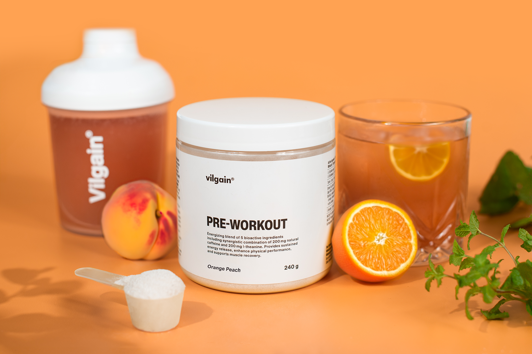 Vilgain Pre-Workout with L-Citrulline Malate Natcaff caffeine, orange peach flavor, and fresh fruit