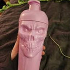 Pink sports skull shaker bottle with pump dispenser and bold skull design, BPA-free materials