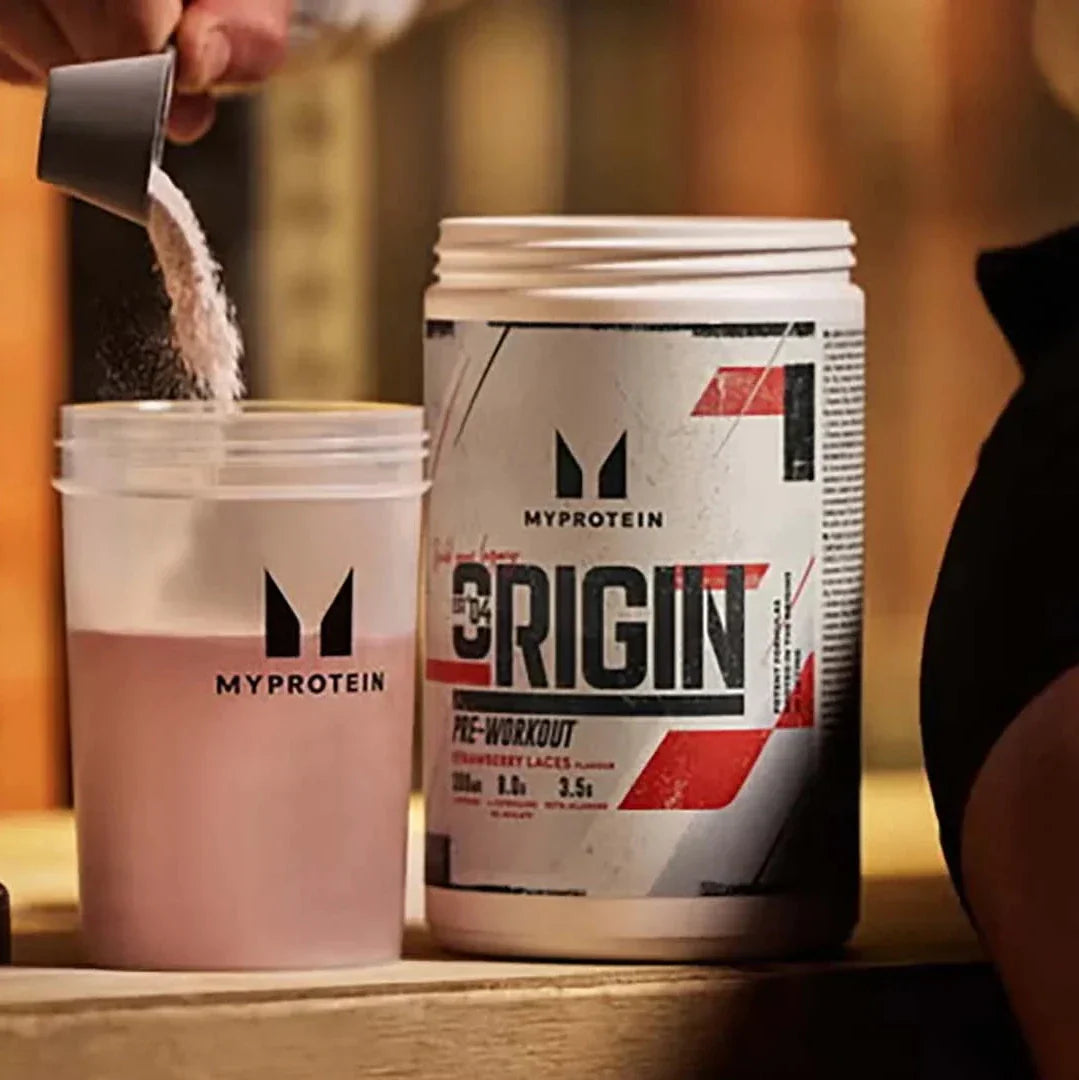 MyProtein Origin Pre-Workout with citrulline malate and beta alanine being poured into a shaker