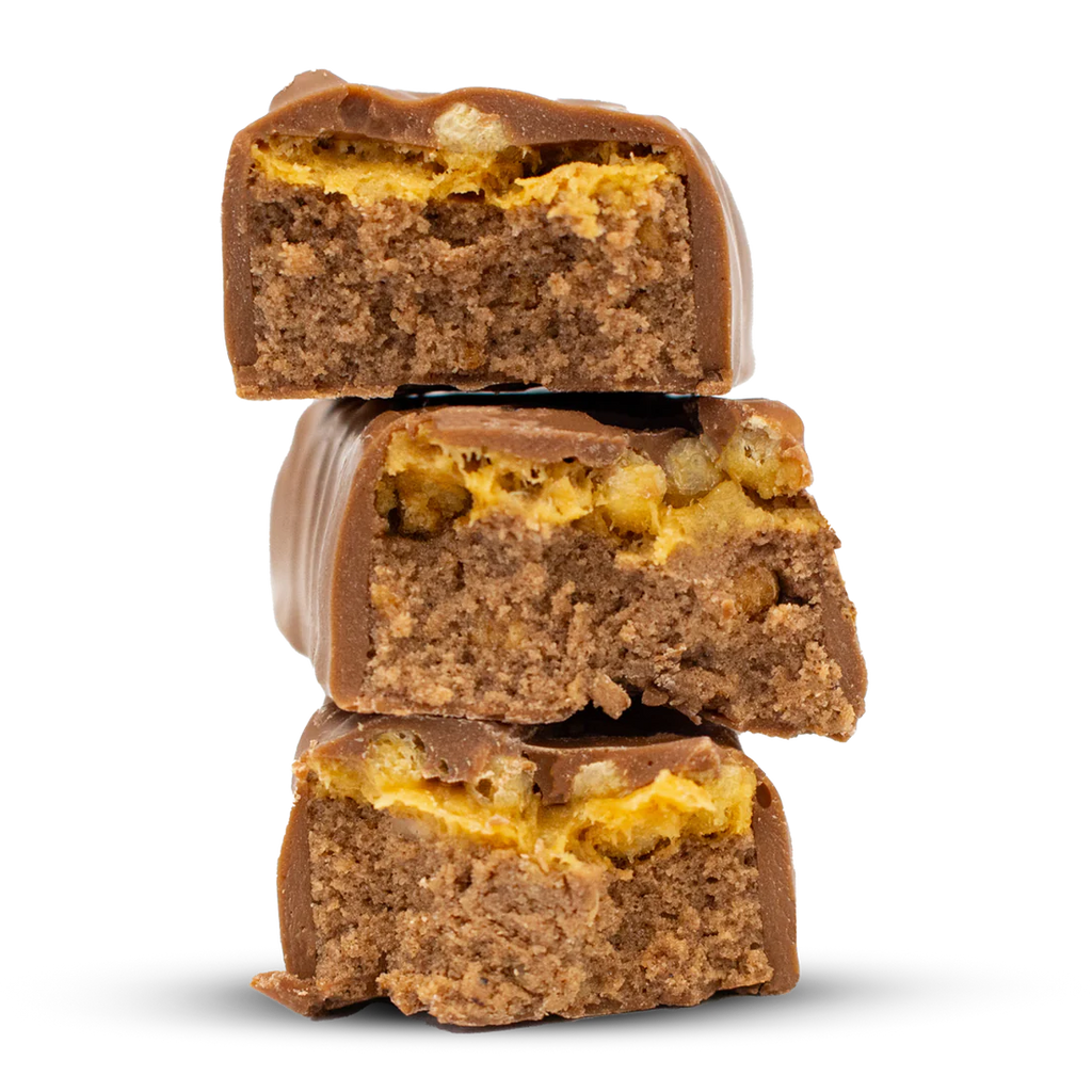 Per4m Protein Bar with crunchy base and nut-filled yellow nougat layer