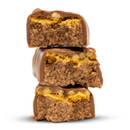 Per4m Protein Bar with crunchy base and nut-filled yellow nougat layer